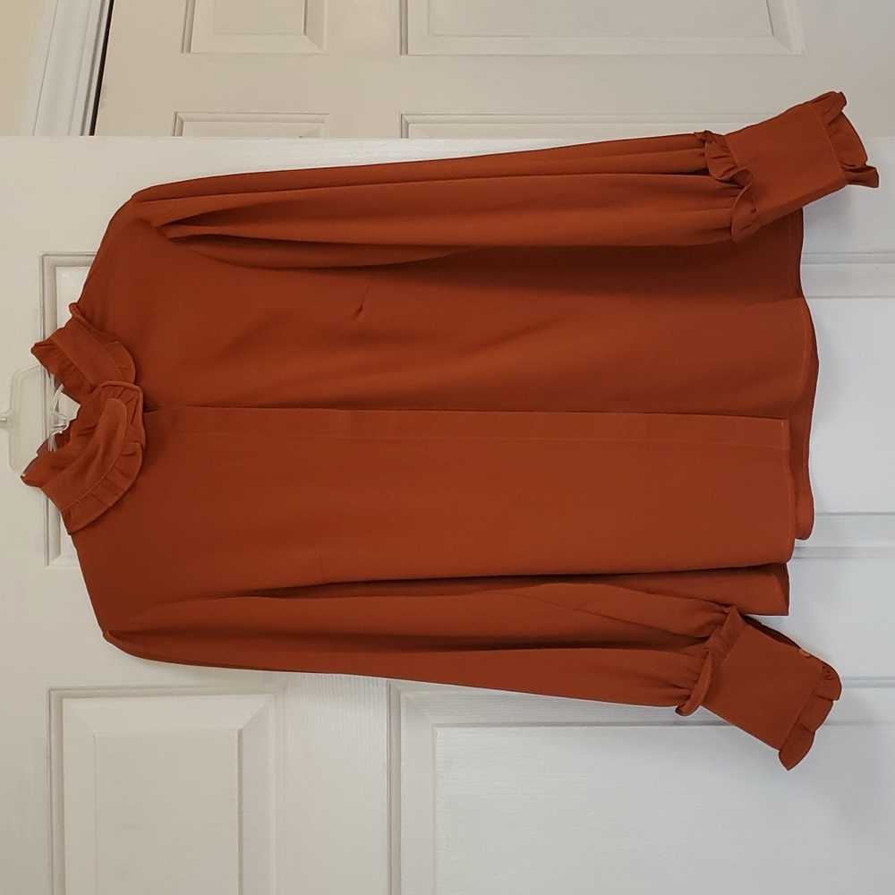 Blouse size medium.